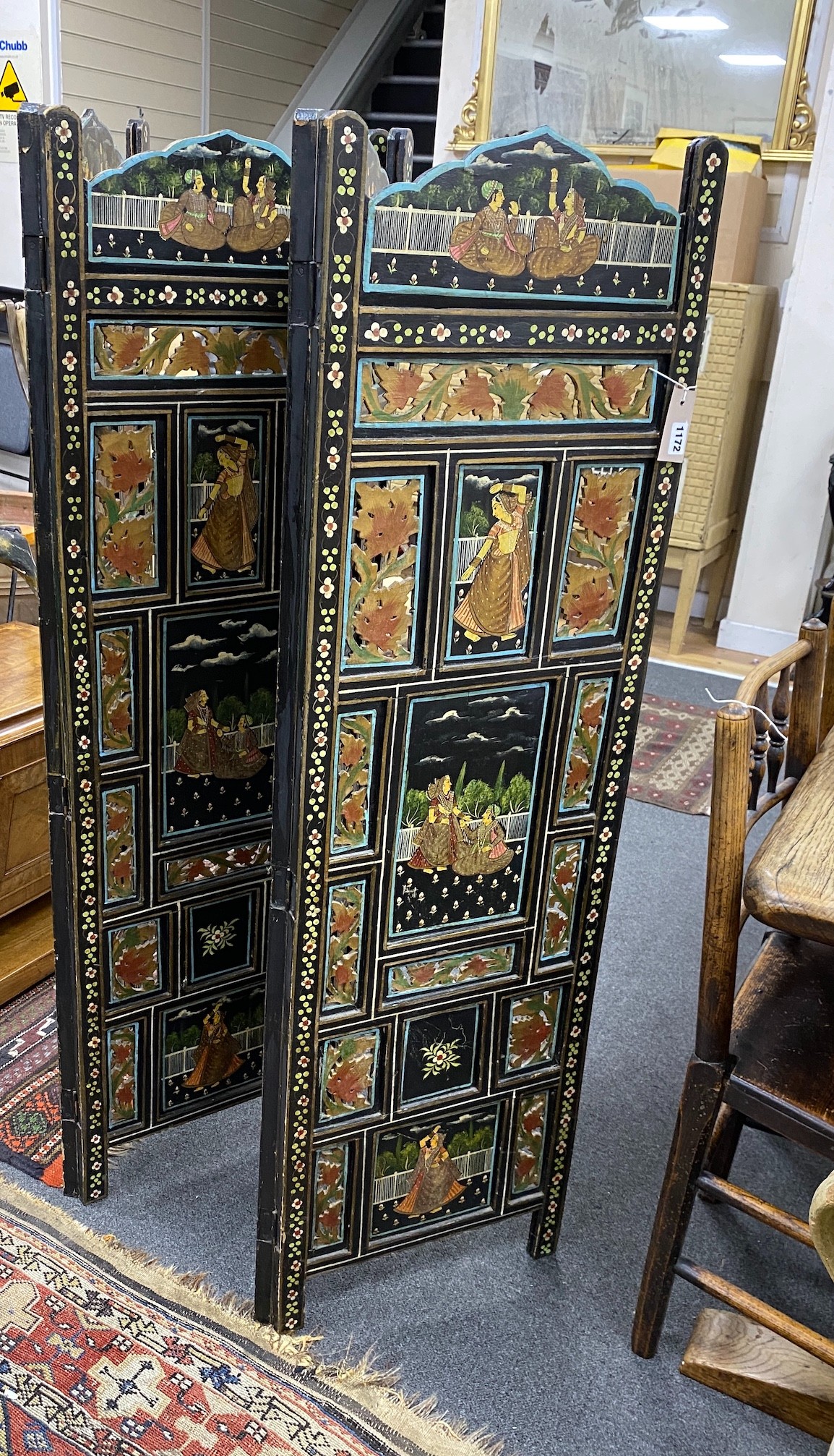 An Indian painted polychrome four fold screen, each panel width 40cm, height 137cm